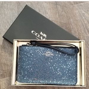 Blue glitter coach wristlet. New in box with tags